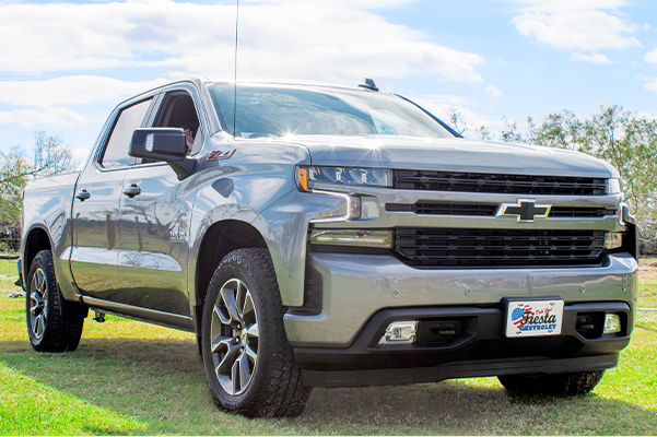 2021 chevy silverado parked in a field