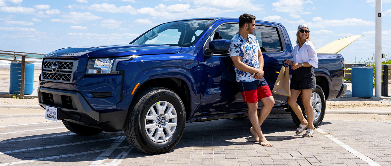 2022 nissan pathfinder parked in front of the beach