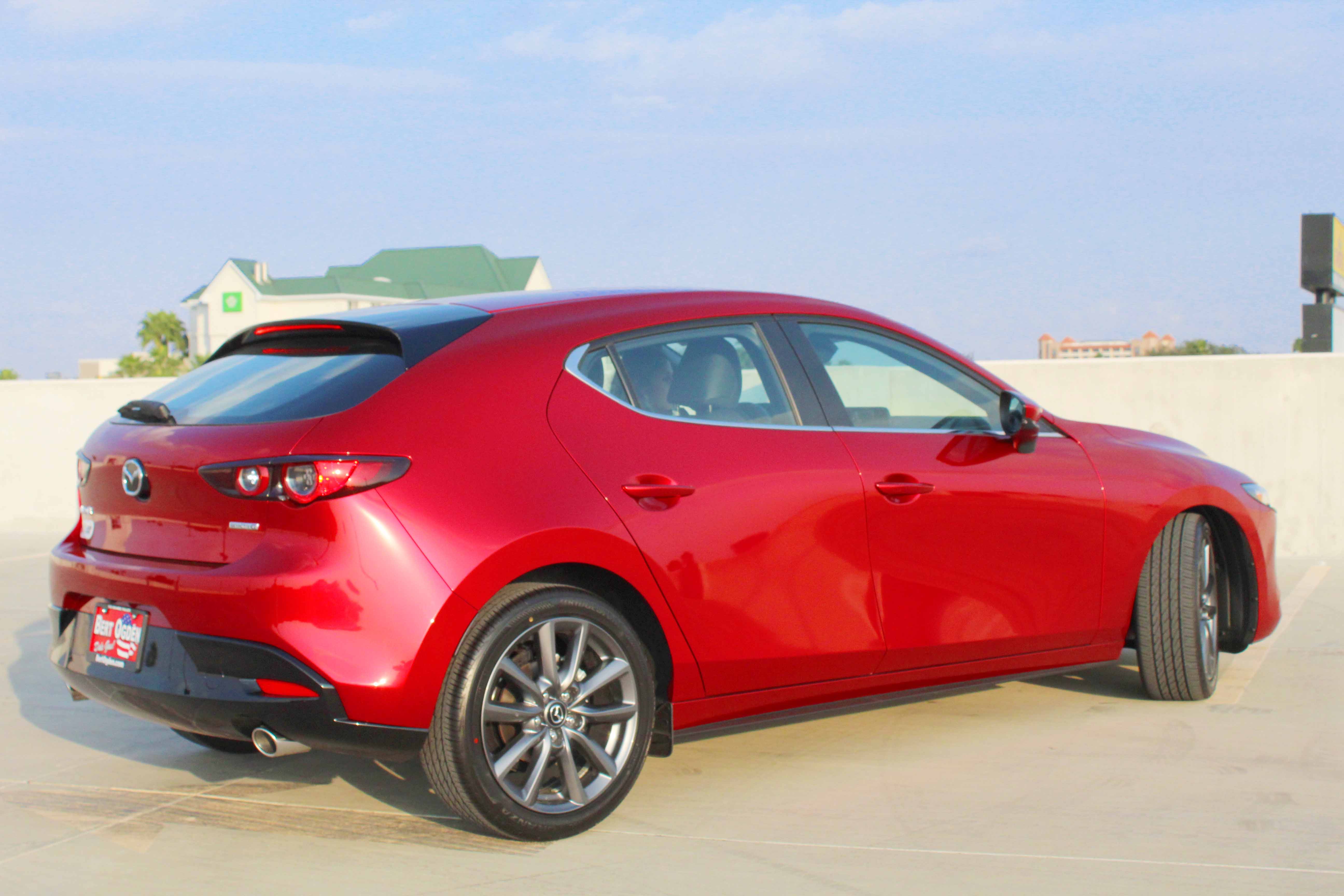 rear view of the 2021 mazda3 in red