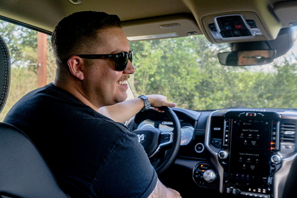 happy guy enjoying his new ram 1500