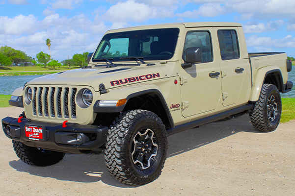 front view of the 2021 Jeep Gladiator parked on dirt