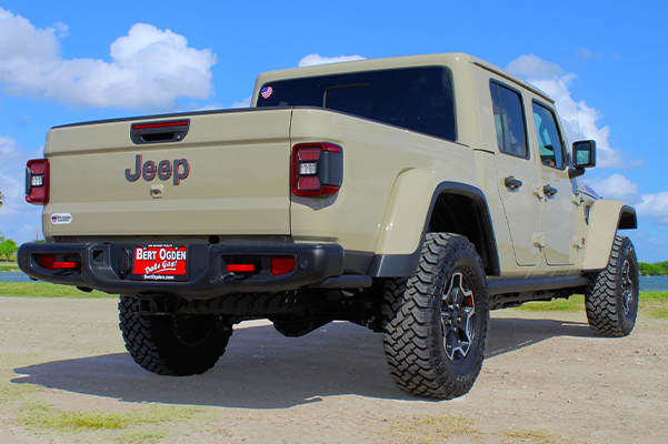 rear view of the 2021 Jeep Gladiator parked on dirt