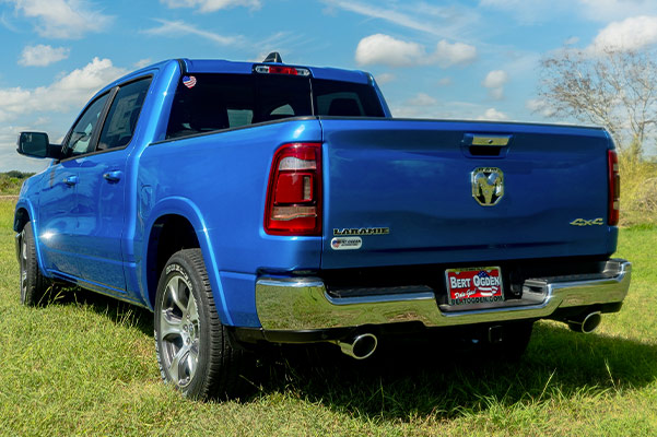 rear view of a ram 1500 parked in a field