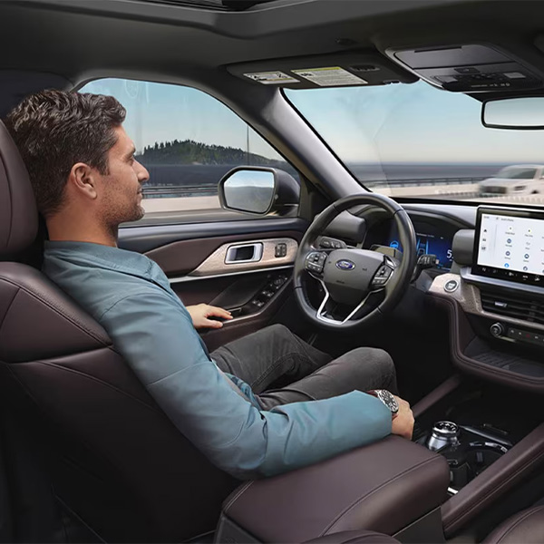 Driver in a 2024 Explorer, driver has hands off steering wheel