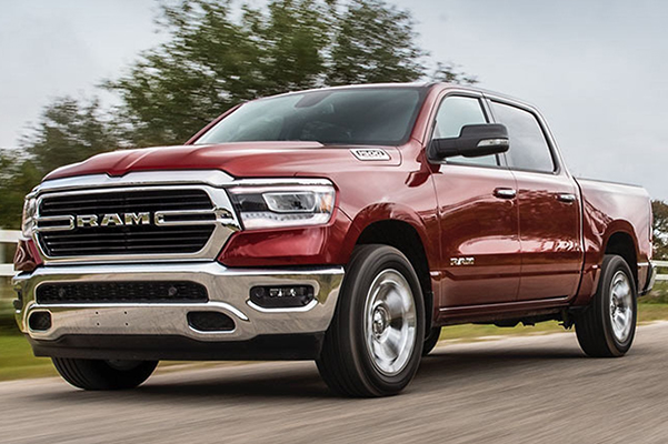 Exterior side view of a red 2020 Ram 1500